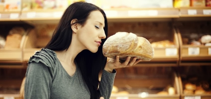 WomanSniffingBread-850x400